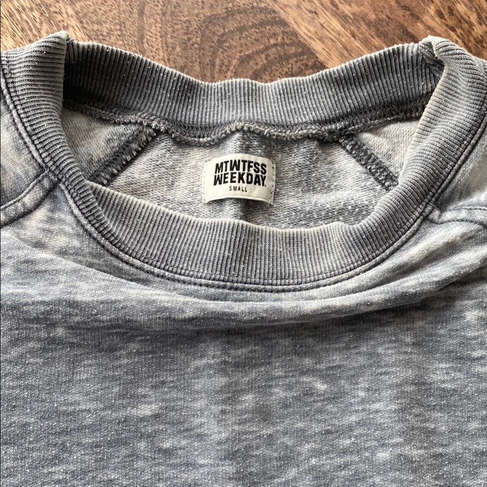 Cheap Monday - Swedish brand 
distressed sweatshirt
